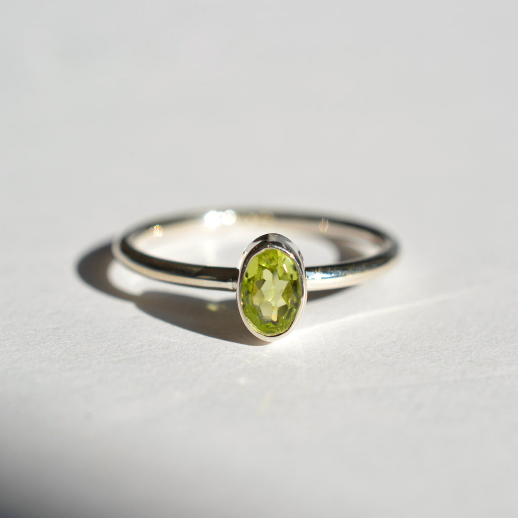 Bezel Set Faceted Peridot Ring