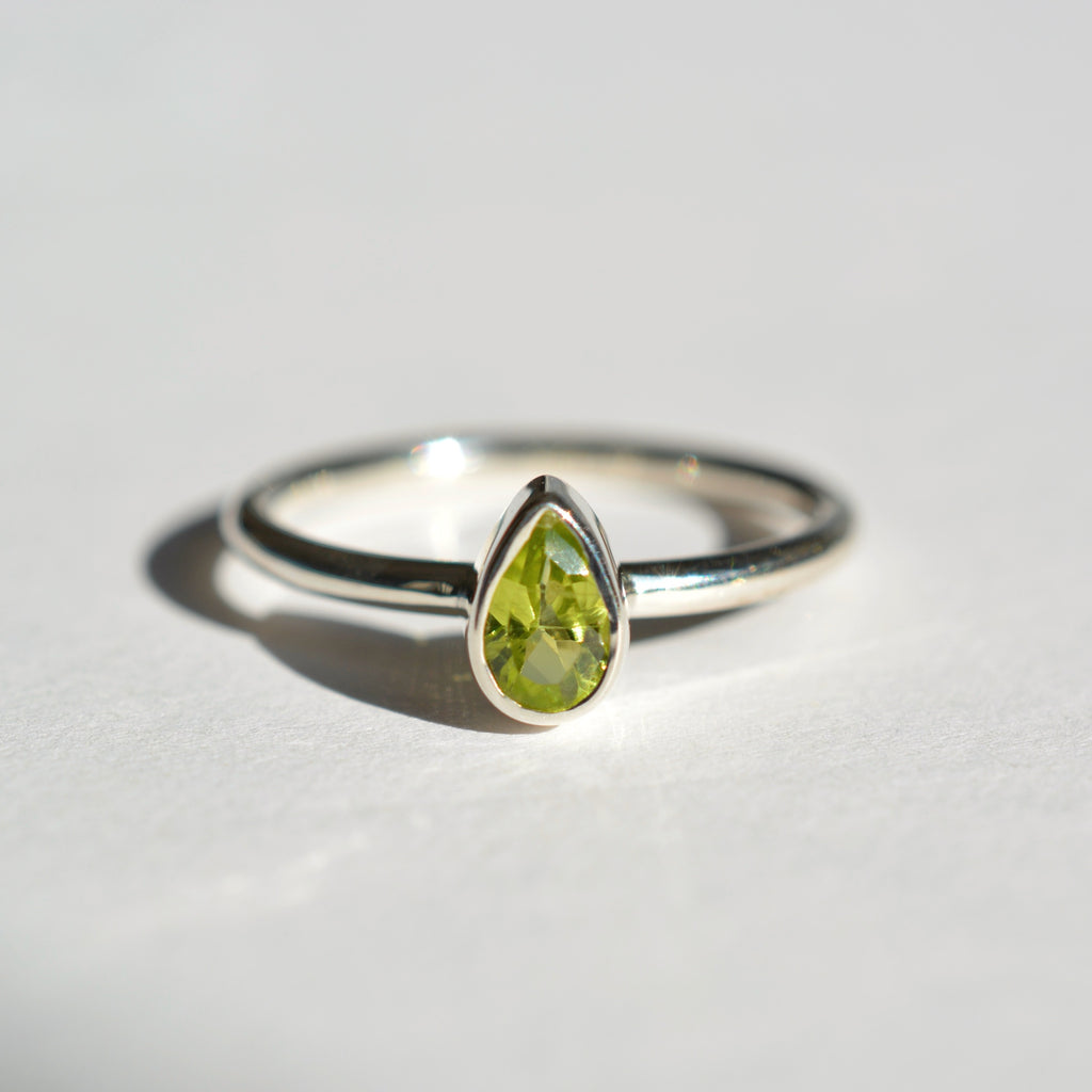 Bezel Set Faceted Peridot Ring