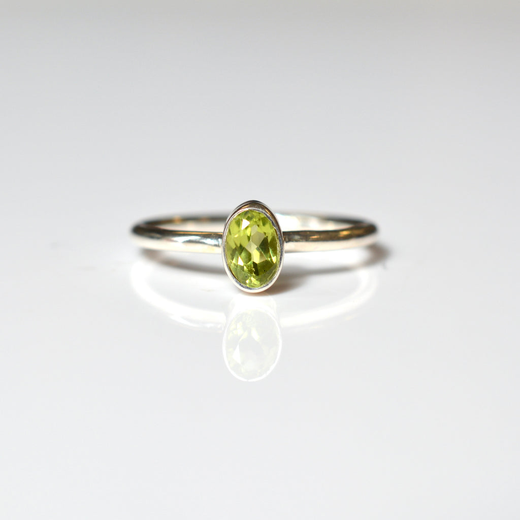 Bezel Set Faceted Peridot Ring