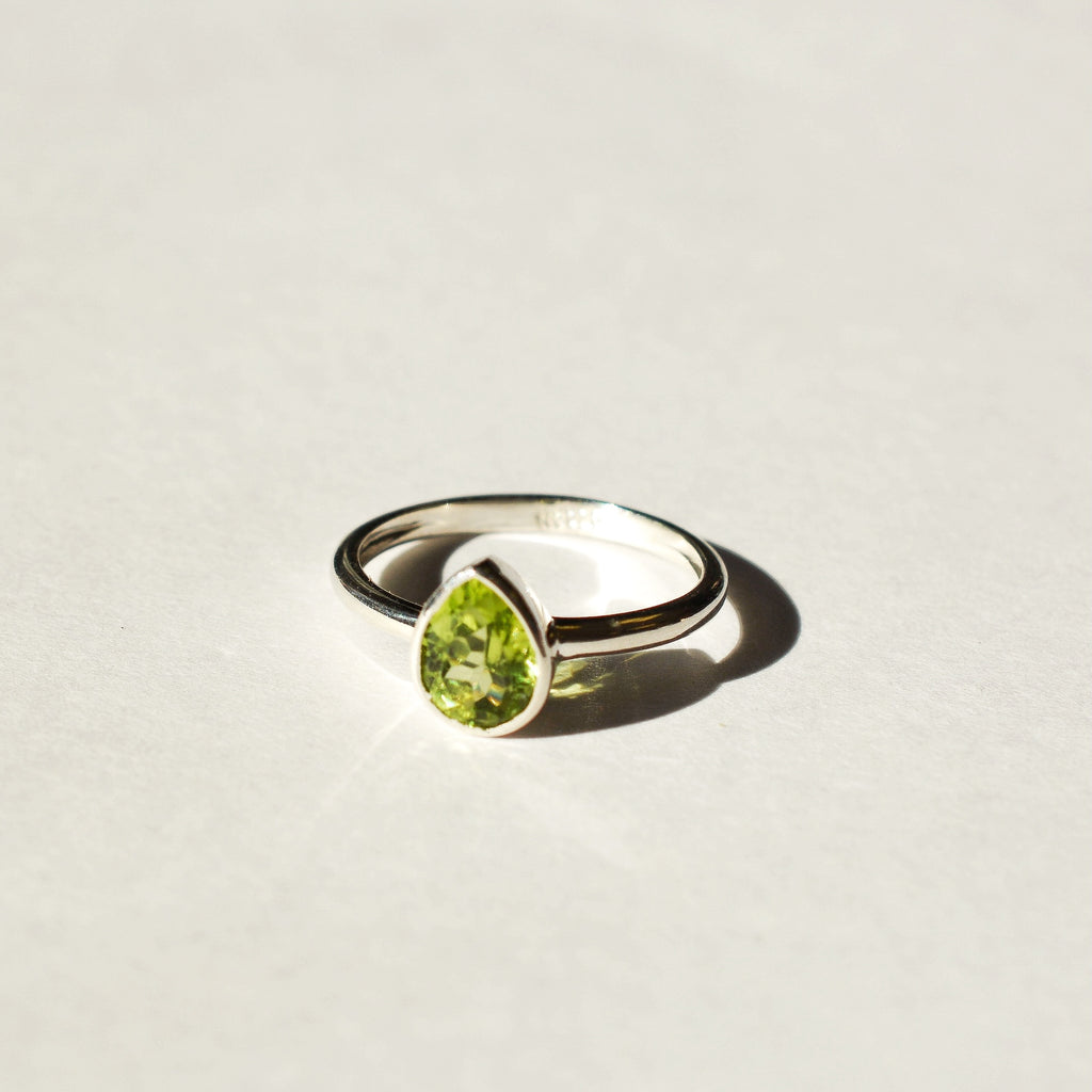 Large Bezel Set Faceted Peridot Ring