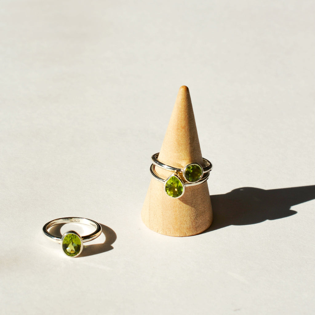 Large Bezel Set Faceted Peridot Ring