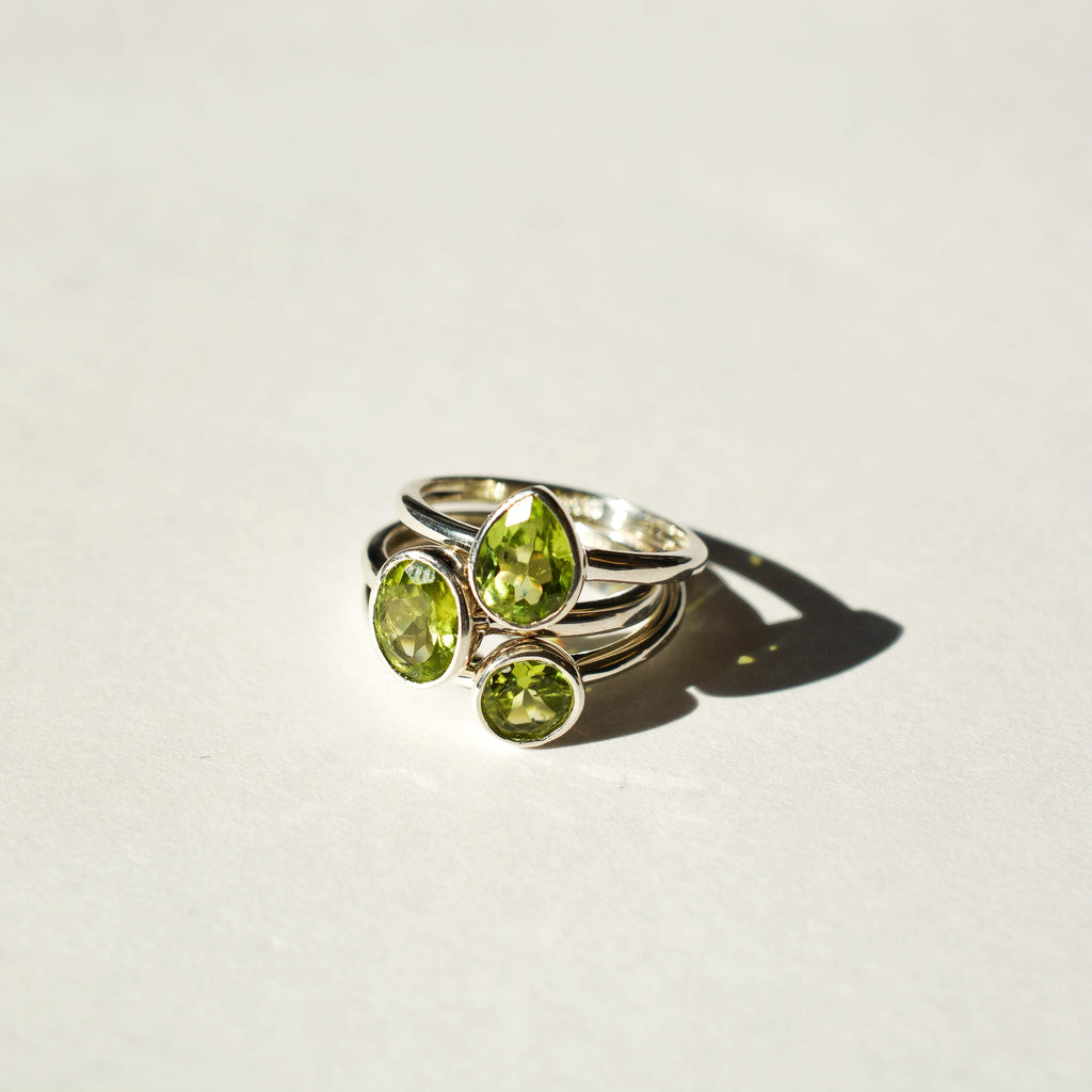 Large Bezel Set Faceted Peridot Ring