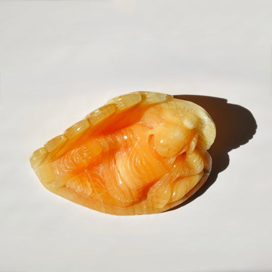 Orange Calcite Reclining Buddha - Small
